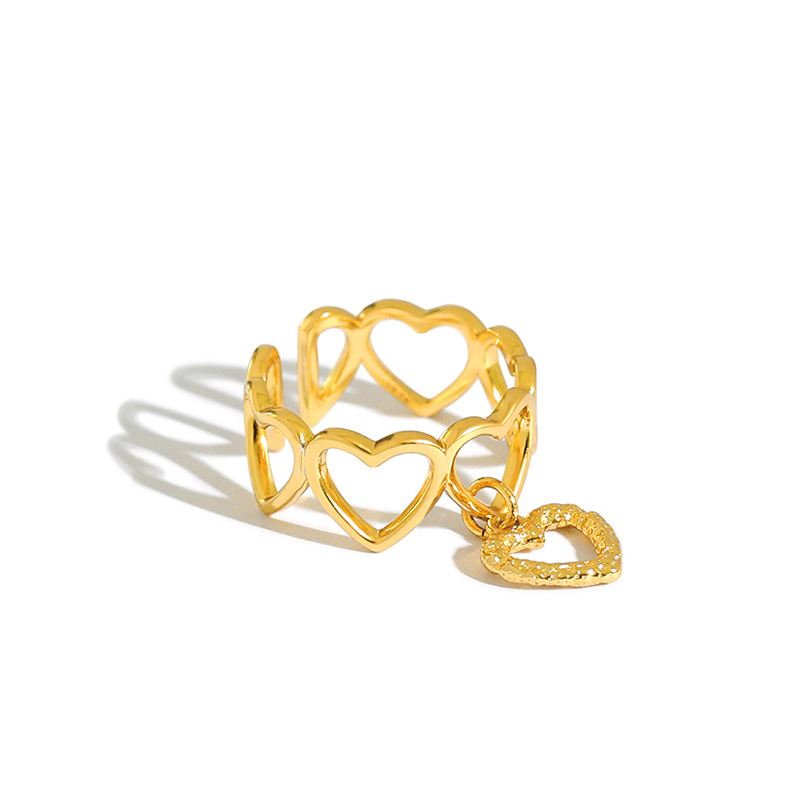 Adjustable ring in 925 sterling silver with openwork hearts 