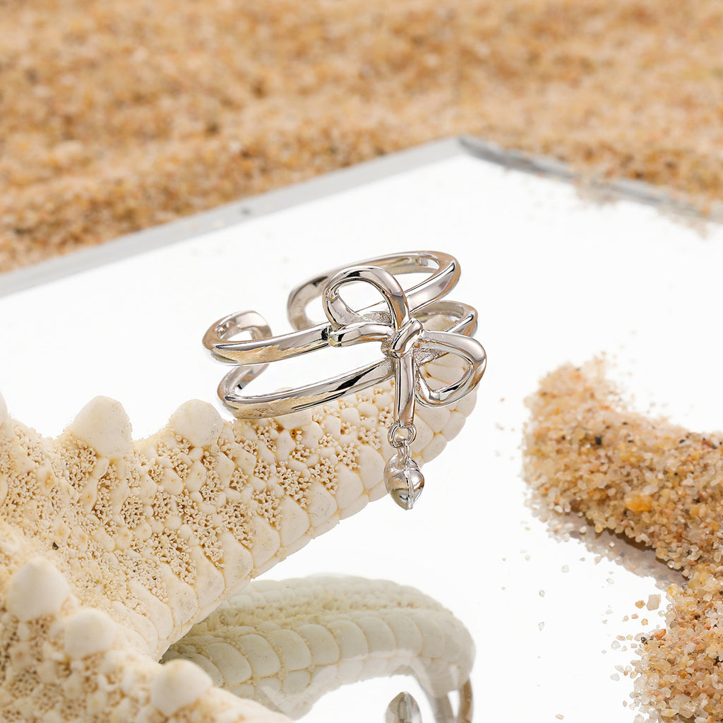 Adjustable double band ring with knot and heart charms in 925 sterling silver 