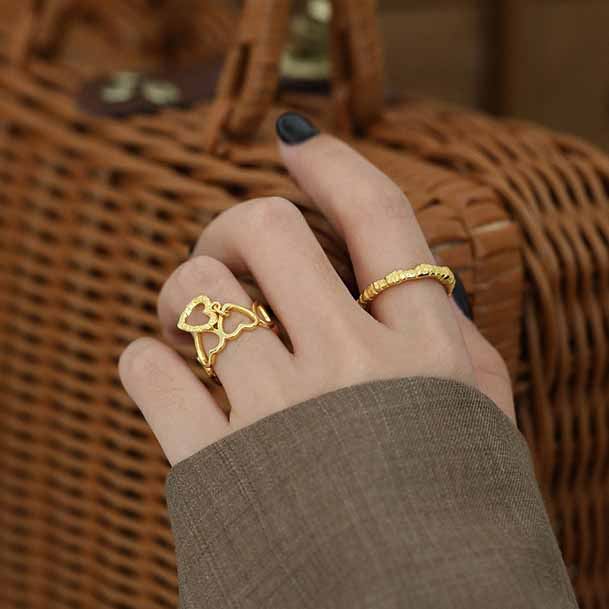 Adjustable ring in 925 sterling silver with openwork hearts 